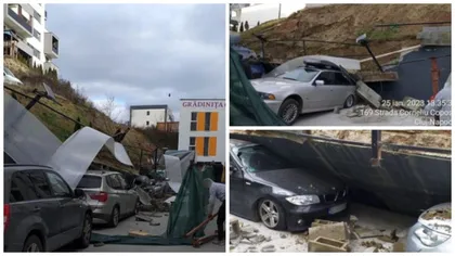La un pas de tragedie. Un zid s-a prăbușit peste șase mașini în apropierea unei grădinițe din Cluj