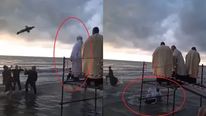 VIDEO: Preotul Atanasie a picat în apa mării, în timpul slujbei de Bobotează: „A căzut popa, bă!