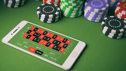 Guvernul britanic propune reguli mai stricte pentru industria jocurilor de noroc
