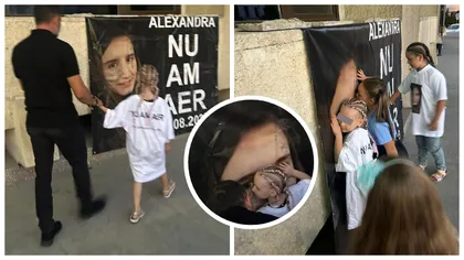 Imaginile durerii la Botoșani, în ziua în care Alexandra Ivanov ar fi împlinit 26 de ani. Fetița ei, îmbrăcată cu un tricou cu mesajul „Nu am aer”, a îmbrățișat cu dor afișul cu poza mamei sale