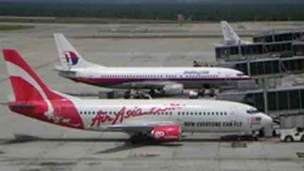O alianta intre Air Asia, Easyjet si Virgin ar putea da startul curselor low-cost pe distante mari