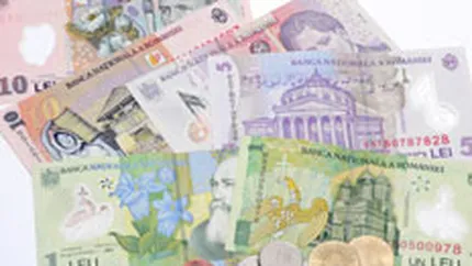 Leul confirma estimarile analistilor si se depreciaza la 3,2574 lei/euro