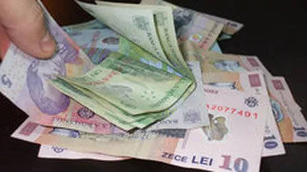 Leul s-a apreciat semnificativ vineri, pana la 4,1276  lei/euro