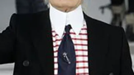 Designerul casei Chanel vrea sa creeze haine pentru publicul larg