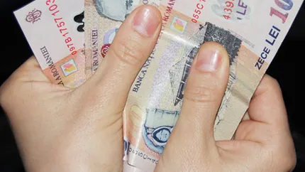 Leul isi continua deprecierea: 4,1073 lei/euro