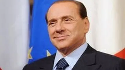 Berlusconi incearca sa calmeze temerile ca Italia va fi atrasa in criza datoriilor