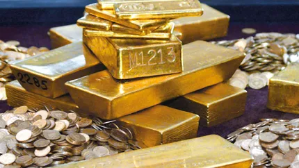 Fierbere pe pietele internationale: Aurul si francul elvetian au atins astazi noi maxime istorice