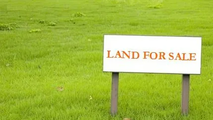 Preturile terenurilor din zone periferice au scazut cu pana la 30% in acest an