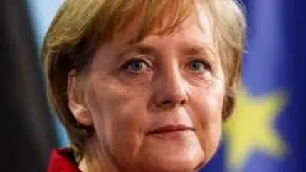 Angela Merkel sustine propunerea lui Draghi de a conditiona ajutorul din partea BCE