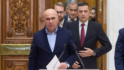 Noile taxe ale Guvernului Bolojan, blocate de AUR la CCR. Majorările de impozite și „taxa Temu” se amână