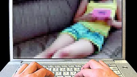 Un asistent universitar din Suceava, acuzat de pornografie infantilă