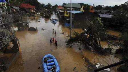 Ziua în imagini. Potop în Filipine. Furtuna tropicală Washi face ravagii