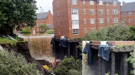 INCREDIBIL! Inundaţiile din Marea Britanie au lăsat un bloc întreg fără fundaţie