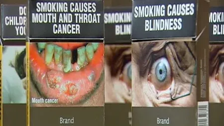 Pachetele de ţigări generice, acoperite cu avertismente, în magazinele din Australia