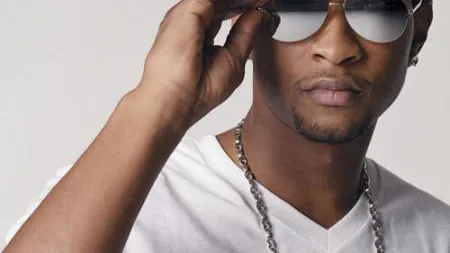 Usher s-a logodit cu Grace Miguel, managerul său