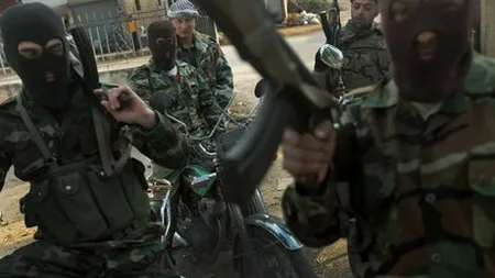 Rebelii sirieni au doborât un avion militar în nordul ţării