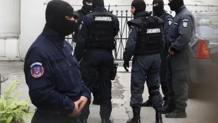 Percheziţii la membrii grupărilor Caran, Duduianu şi Vancică, suspectaţi de cămătărie şi şantaj