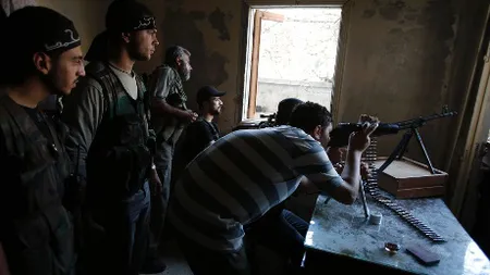 Cea mai ÎNSPĂIMÂNTĂTOARE FOTOGRAFIE a războiului din Siria. Ce a făcut un SOLDAT pentru o ŢIGARĂ