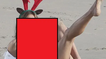 Cea mai SEXY CRĂCIUNIŢĂ: Un model Victoria's Secret şi-a pus COARNE... de REN şi a renunţat la haine FOTO