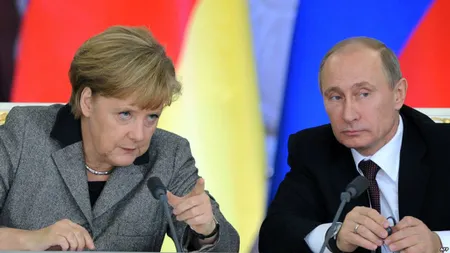 Putin şi Merkel vor organizarea unei noi reuniuni a Grupului de contact pentru Ucraina