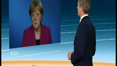 Angela Merkel, la un pas de leşin la postul public de televiziune VIDEO