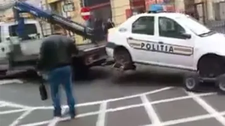 Am trăit s-o vedem şi pe asta! O maşină de poliţie, parcată neregulamentar, ridicată de poliţiştii locali
