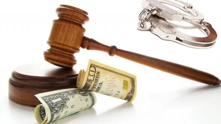 Fost prodecan de la ASE, condamnat la şase ani de închisoare pentru luare de mită