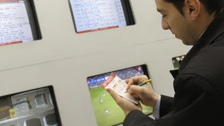 Noi reguli: Pariorii nu mai comit o infractiune cand pariază online, statul ii taxeaza pe operatori