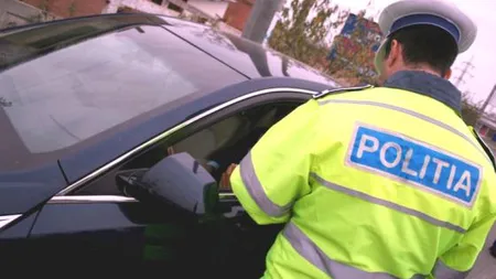 SCANDAL în trafic: Un şofer beat, încătuşat după ce a devenit agresiv cu poliţiştii