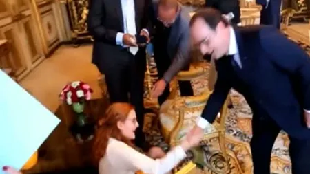 Incident amuzant: Invitată la Elysee, pusă la pământ de câinele preşedintelui Hollande VIDEO