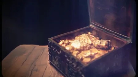 Un milionar excentric a ascuns în munţi un cufăr plin cu aur şi pietre preţioase. Îl oferă oricui îl va găsi