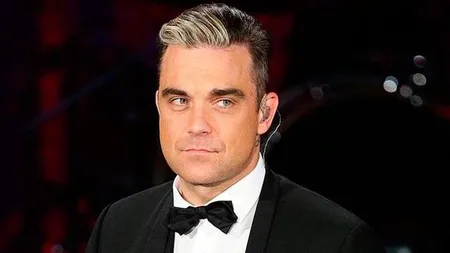 Robbie Williams a ajuns în România: Incident pe aeroport VIDEO