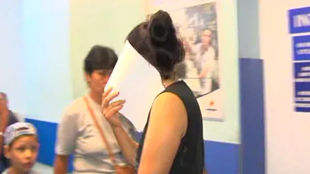 Un bărbat beat şi-a tăiat cu o sticlă spartă soţia, cumnata şi cumnatul