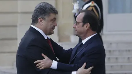 Confruntări în faţa Parlamentului de la Kiev. Hollande se solidarizează cu Poroşenko