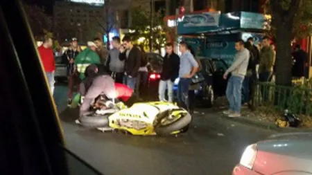 Accident TERIBIL în centrul Capitalei. O motociclistă, lovită în plin de o masină