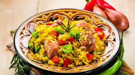 Reţeta zilei: Paella cu carne de porc