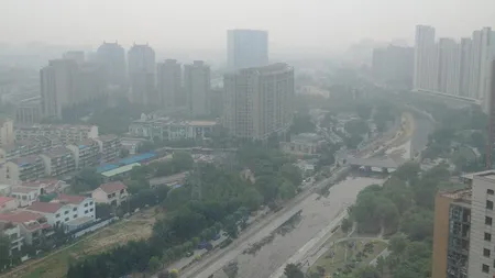 Cod portocaliu de poluare în capitala Chinei, până la sfârşitul săptămânii. Sunt aplicate mai multe restricţii