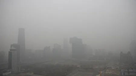 China se sufocă într-un nor de poluare