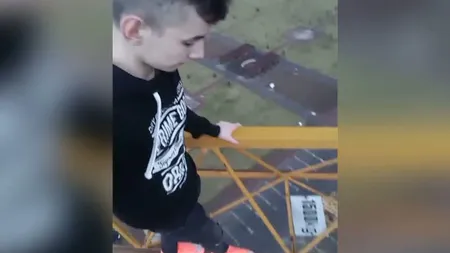 Imagini care îţi taie răsuflarea filmate de un tânăr. A făcut echilibristică la zeci de metri înălţime