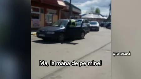 Scandal şi bătaie cu poliţia în piaţă VIDEO