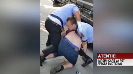 Imagini şocante în Piteşti. Un bărbat, încătuşat de patru poliţişti VIDEO