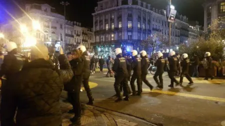 Incidente Bruxelles. Patru persoane aduse în faţa justiţiei, un poliţist rănit