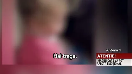Anchetă după ce o fetiţa de 2 ani a fost încurajată de părinţi să bea alcool şi să fumeze VIDEO