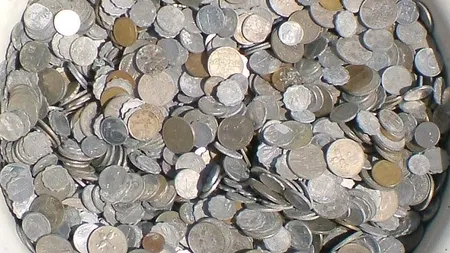 Răzbunarea unui ieşean. Şi-a plătit amenda în 120 de kilograme de monede
