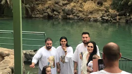 Florin Salam şi Roxana Dobre s-au botezat în apele Iordanului