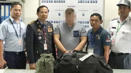Doi români riscă închisoare pe viaţă în Cambodgia pentru trafic de droguri