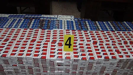 Contrabandă de amploare cu trenul, pe ruta Chişinău-Bucureşti. Patru angajaţi reţinuţi, peste 100.000 pachete de ţigări confiscate