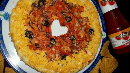 Pizza Crunchy Crust. Unul dintre ingrediente este berea