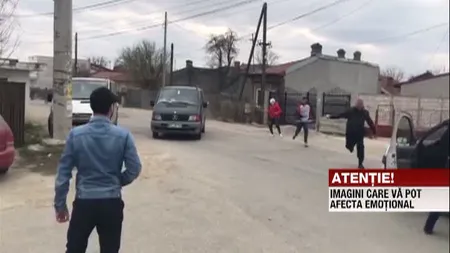 Bătaie cu bâte şi topoare şi împuşcături în faţa sediului poliţiei din Bolintin