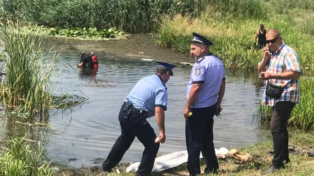 Ancheta se extinde: Ce au scos scafandrii din lacul din apropierea locuinţei criminalului